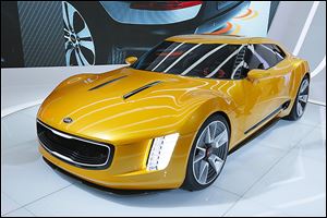 Analysts say Kia is working hard to get away from its image as an economy brand with its GT4 Stinger concept car.