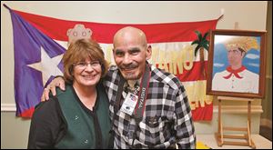 Left to right Linda McCall and Chico Calderon at the 18th Annual Three Kings Day Celebration and fundraiser Saturday, 01/04/14, at the L'Ambiance Banquet Hall in Toledo, Ohio.