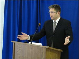 Federal public defender Allen Bohnert talks about the execution of his client, death row inmate Dennis McGuire, by a never-tried lethal drug process, on Thursday at the Southern Ohio Correctional Facility in Lucasville, Ohio. Bohnert called the procedure 