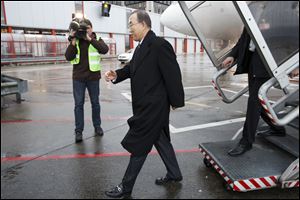 United Nations Secretary-General Ban Ki-moon arrives at Geneva International airport, in Geneva, Switzerland, today to join this week's Syria peace talks in Montreux and Geneva.
