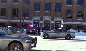 Police investigate a reports of a shooting at Purdue University in West Lafayette, Ind., Tuesday.