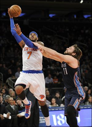 Carmelo Anthony made 23 of 35 shots, one when he leapt from halfcourt to beat the halftime buzzer, and even added 13 rebounds in the NBA’s highest-scoring performance this season.