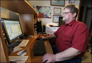 Toledoan Robert Geis checks online job sites that email him daily, but he has not yet found employment. 