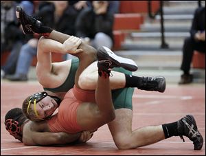 Clay’s Kevin Witt scored an 18-1 technical-fall victory against Elyria’s Cameron King at 182 pounds in the regional final.