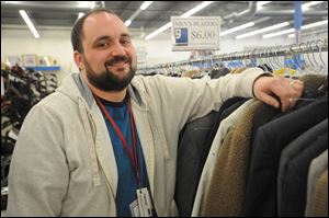 Tyler Gedelian, manager of the Monroe Goodwill store.