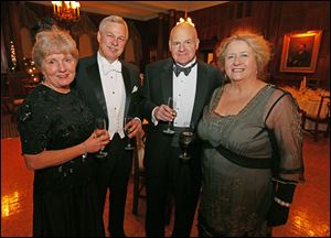 Peggy and Ben Brown with Bryan Smith and Ann Sanford at the Downton Abbey Dinner at the Toledo Club, Saturday, Jan. 25, 2014.