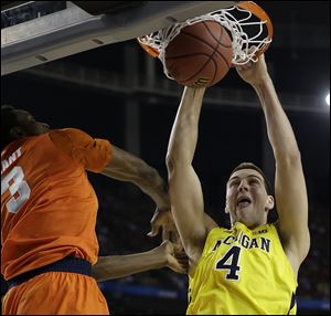 Michigan's Mitch McGary entered the season with a back problem and has played only eight games, most recently on Dec. 14 against Arizona. 