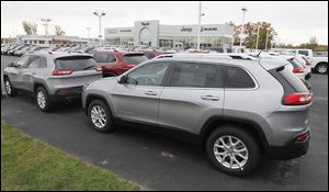 Toledo-built Cherokees are lined up at Yark Jeep.  Consumer Reports criticized the vehicle for being “underdeveloped and unrefined,” and for not getting the “fundamentals right for everyday use.”
