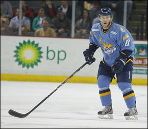 Toledo Walleye player Aaron Clarke (8) against the Wheeling Nailers earlier this year.