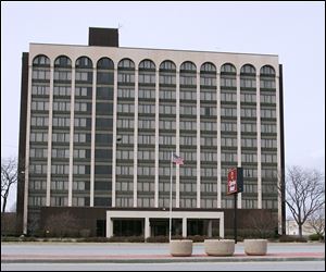 The vacant former Clarion Hotel on Reynolds Road in South Toledo has been called a major impediment to development.  