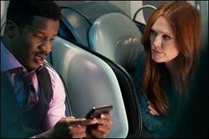 Nate Parker, left, and Julianne Moore in a scene from 
