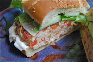 Quick-Ground Chicken Burgers can be dressed up with lettuce, tomato, or any of your favorite toppings.