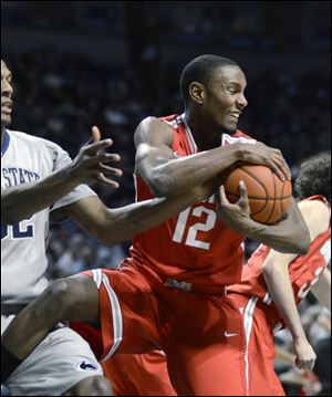 Ohio State's Sam Thompson takes possession of a rebound during the first half Thursay in State College, Pa.