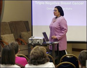 Dr. Iman Mohamed speaks at the Eleanor N. Dana Cancer Center in Toledo during the ‘A Different Shade of Pink’ program on Monday, which was Triple Negative Breast Cancer Day nationwide. 