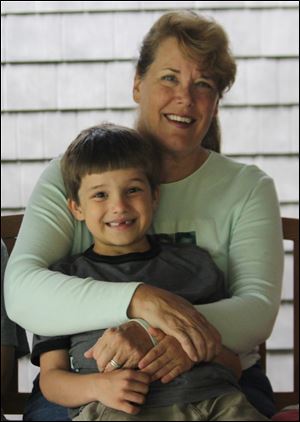 Raphael, with grandmother Janet Everhard, is holding his own.