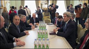 Secretary of State John Kerry and Russian Foreign Minister Sergei Lavrov meet at the Russian Ambassador's Residence in Paris, today.