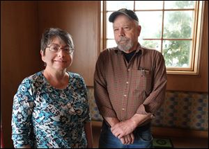 REL quest08   Barb Williams and Phil Deckebach are pictured in Toledo, Tuesday, March 4, 2014.  The have written a children's book about an atheist summer camp called 'Welcome to Camp Quest.'  The Blade/Dave Zapotosky