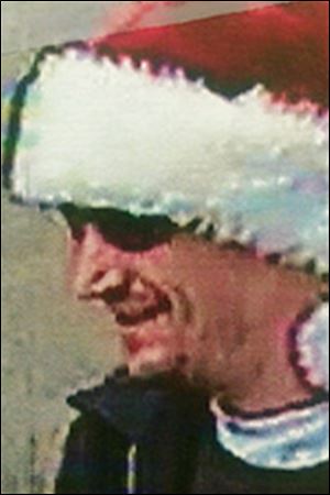 Robber in Santa hat