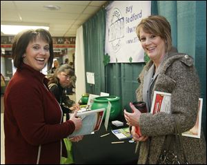 Bedford Business Association members Sandie Greenwood-Mominee, left, and Sue Kujawa at the group's annual trade fair in March, 2013.