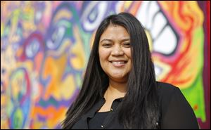 Guisselle Mendoza, new executive director of Adelante, has six years experience with the financially strapped agency.