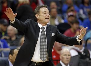 Louisville and head coach Rick Pitino look to make it back-to-back championship.