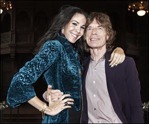 Designer L’Wren Scott, left, girlfriend of Mick Jagger, was found dead Monday in Manhattan of a possible suicide.
