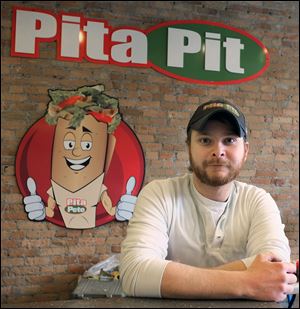 Steve Gesicki is one of the owners of the new Pita Pit on South St. Clair Street. The restaurant plans to be open early morning, late night, and on Sundays to accommodate the area’s residential population.