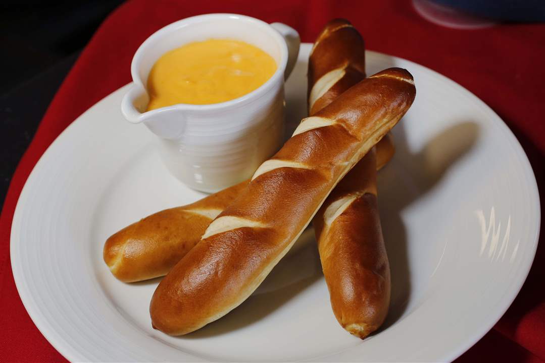 Tasting-Bavarian-pretzel-sticks