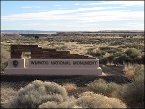 A sign marks the entrance of Wupatki National Monument in northern Arizona. 
