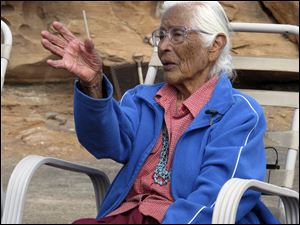 Stella Peshlakai speaks about her family history at the Wupatki National Monument, Ariz. The Peshlakai descendants are fighting to gain residency rights on land their ancestors settled before the creation of the monument. 