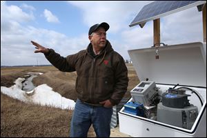Terry McClure, vice president of the Ohio Soybean Council and an Ohio Nature Conservancy board member, is one of about 33 Ohio farmers who have volunteered to have the chemical composition of their runoff analyzed.
