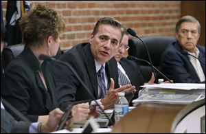 Perrysburg Mayor Mike Olmstead speaks during Tuesday’s City Council meeting at the Municipal Building on Costco’s special-use permit for a site at State Rt. 25 and Eckel Junction Road.