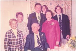 At a family 50th anniversary celebration at the Toledo Club in 1973, Joe Celusta, front left in the plaid jacket, who is now running for Toledo City Council, stands beside his grandfather Ollie Czelusta, who was Toledo mayor from 1950-51 and 1954-57. Behind them are, from left, Nancy Celusta, John Ollie Celusta, Chris Aloysuis Celusta, Josephine Czelusta, and John Andrew Celusta. The younger generation spells their last name differently from their ancestors. 