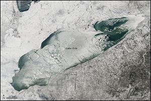 The satellite image above, taken by the NASA Earth Observatory on Jan. 9, shows the extensive ice cover on Lake Erie that developed this winter. The persistent cold temperatures and abundance of subzero days created ice that covered 92.2 percent of the total surface area of the Great Lakes on March 6, according to the Weather Channel. 