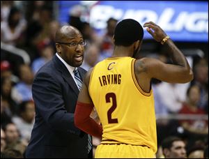 Cleveland Cavaliers's Mike Brown, left, talks to Kyrie Irving earlier this month in Los Angeles.