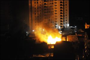 A fire burns at a restaurant after an earthquake in Iquique, Chile.