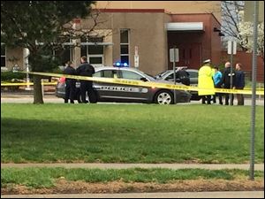 Authorities respond the Jewish community center after a shooting in Overland Park, Kan., Sunday.