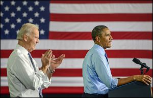 Vice President Joe Biden applauds as President Obama speaks to about 300 at Allegheny County Community College in Oakdale, Pa. Mr. Obama said on Wednesday that he and Mr. Biden were on ‘a little road trip.’ 