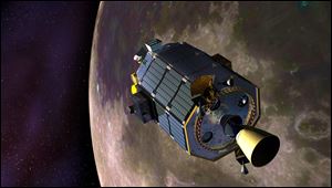 In this artist's concept provided by NASA the Lunar Atmosphere and Dust Environment Explorer (LADEE) spacecraft is seen orbiting the moon.