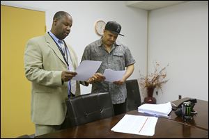 Willie Knighten, Jr., an ex-gang member who works for The Ridge Project, trains Dominic Vasquez, a former gang member and new ‘Tyro,’ for a job. Knighten helps teach incarcerated men how to get off the dangerous streets. 