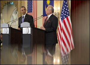 U.S. President Barack Obama and Malaysian Prime Minister Najib Razak participate in a joint news conference today at the Prime Minister's Office, in Putrajaya, Malaysia.