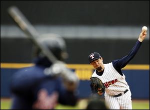 Toledo’s Robbie Ray throws a pitch Monday night against Gwinnett. He surrendered seven hits in five scoreless innings but did not walk a batter to get his third win of the season. 