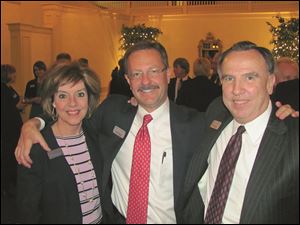 From left, Sharon Brown, Mark Ridenour, and Larry Boyer, all with Waterford Bankcorp Inc., enjoy the shareholders’ banquet. 