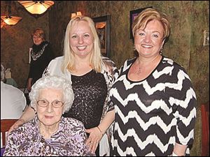 From left, Thelma Cyigon of Maumee with D.O.V.E. trustee Julie Oswald Abbey of Maumee, and Candy Vanderhaven of  Plymouth, Mich.