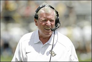 George O'Leary coaches at Central Florida. He was forced to resign at Notre Dame in 2001, five days after accepting the job, after misrepresentations were discovered on his resume.
