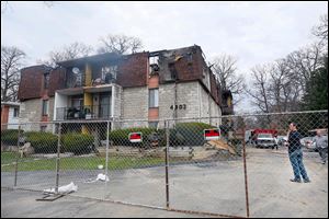 The Red Cross assisted people who were displaced by a fire at this apartment building on Secor Road last month.