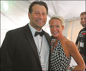 Steering committee member Moussa Salloukh and his wife Jennifer enjoy the gourmet food and wine during Taste of the Nation Toledo.