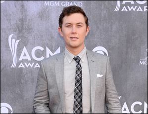 Police say Scotty McCreery was the victim of an early morning home invasion near the campus of North Carolina State University, where he is a student. 
