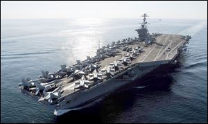 The Nimitz-class aircraft carrier USS John C. Stennis travels the Strait of Hormuz in 2011. The Pentagon has dealt with Iranian warnings to attack U.S. aircraft carriers in the Persian Gulf for more than 30 years.  Officials say the latest threat would have ‘zero impact on U.S. Navy operations.’ 