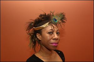 Adia Conlifee, of West Toledo, attended the Circle 2445's annual Kentucky Derby party at the Toledo Museum of Art.
